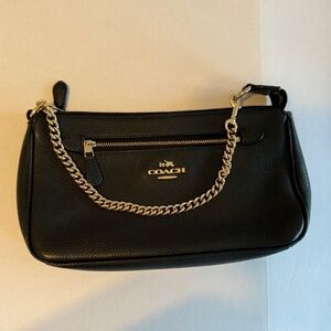 feminine design in polished pebble leather